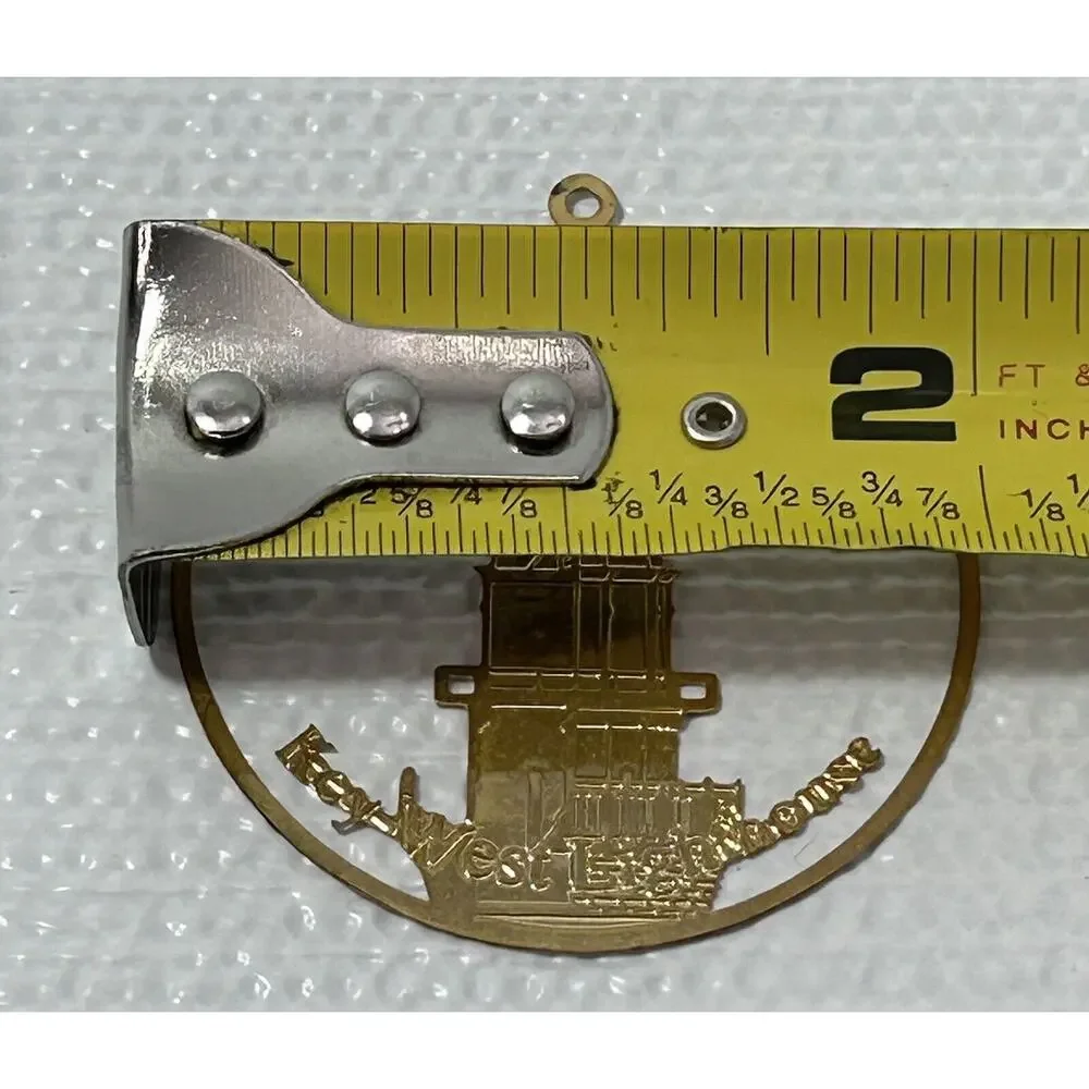 2” Merry Christmas Key West Lighthouse Gold Tone Christmas Tree Ornament Vintage